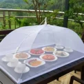 Large pop-up white mesh food cover tent - foldable and washable, suitable for outdoor picnics, barbecues, and parties